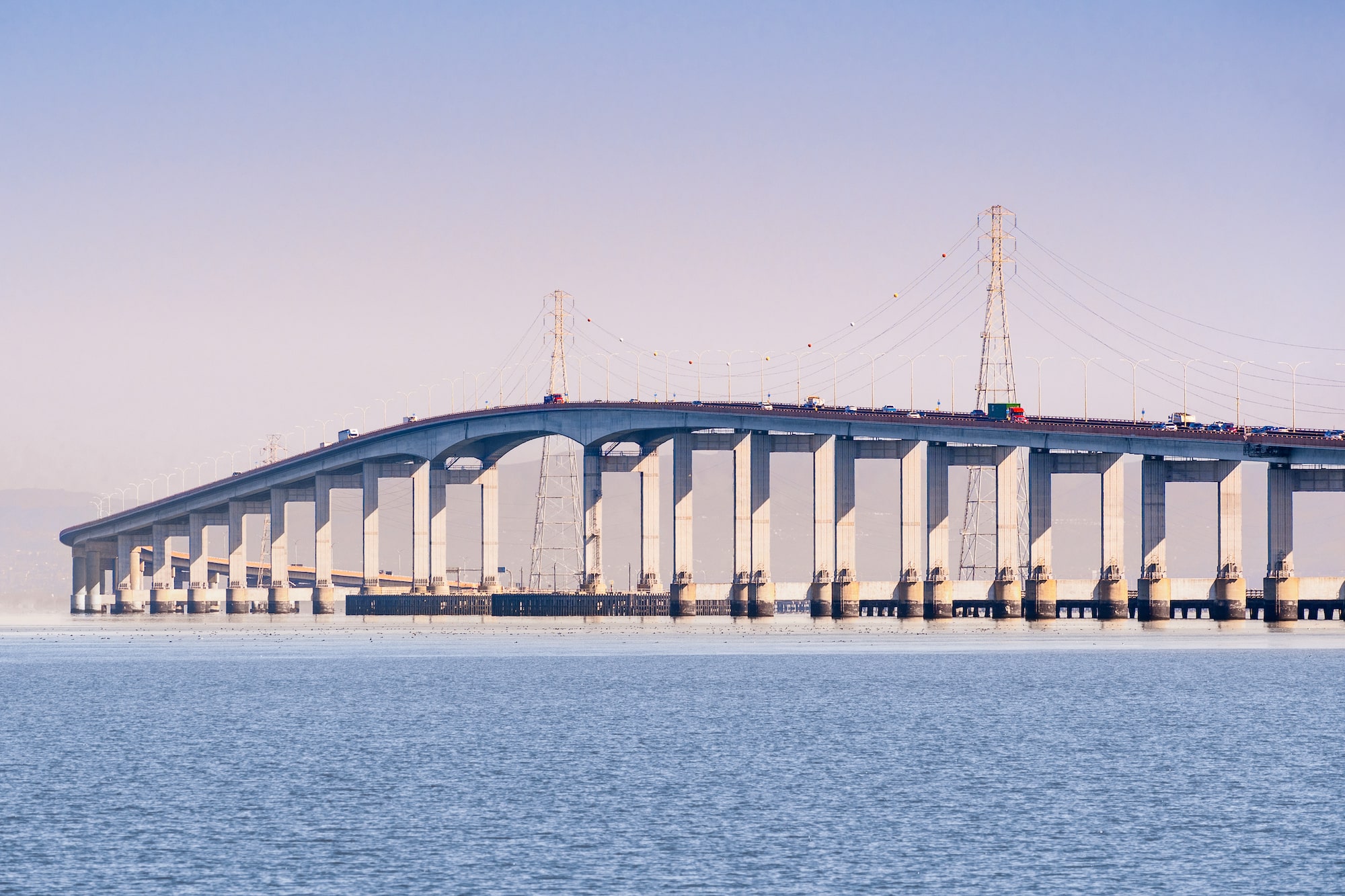 San Mateo Bridge in San Fransisco with boats underneath